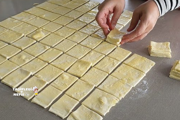 Katman katman açılan ev yapımı milföy hamuru ile hazırlanan nefis peynirli börek
